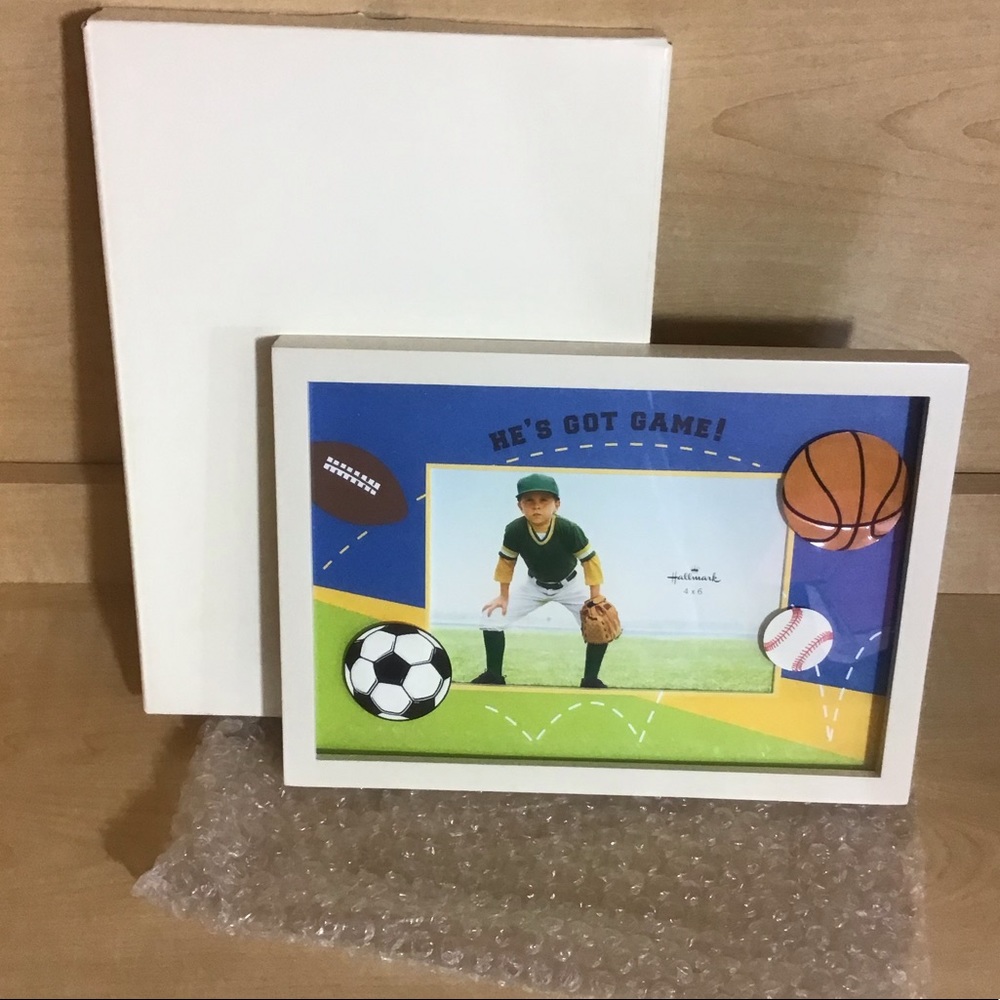 He’s got a game picture frame from Hallmark .